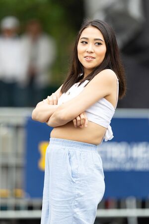 Grand Rapids, Michigan, USA - June 15, 2019: Young Men and Women, performing modern K-POP dance...