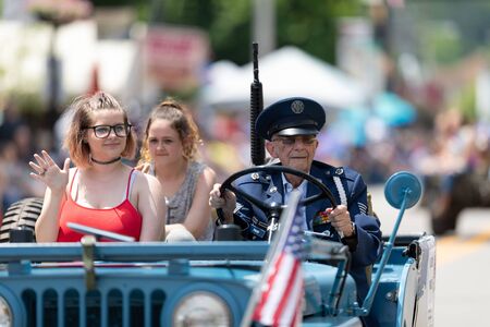 Buckhannon, West Virginia, USA - May 18, 2019: Strawberry Festival, Military veterans of the United States being driven on jeeps during the paradeのeditorial素材