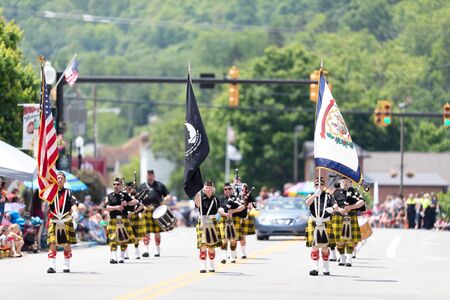 Buckhannon, West Virginia, USA - May 18, 2019: Strawberry Festival, The West Virginia Highlanders from Davis and Elkins College, performing at the paradeのeditorial素材