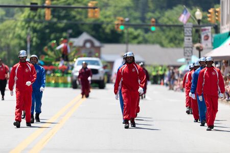 Buckhannon, West Virginia, USA - May 18, 2019: Strawberry Festival, The National Award Winners Marching Elites Drill Team, marching down the street during the paradeのeditorial素材