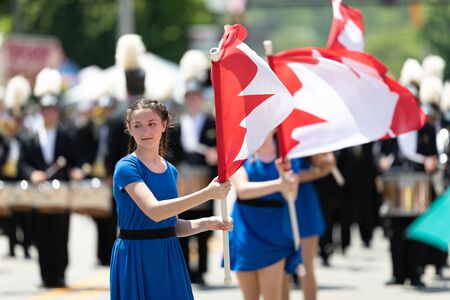 Buckhannon, West Virginia, USA - May 18, 2019: Strawberry Festival, The Diplomats Drum and Bugle Corps marching band from Windsor, Canada performing at the paradeのeditorial素材