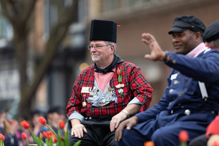 Holland, Michigan, USA - May 11, 2019: Tulip Time Parade, Men wearing traditional dutch clothing, riding on a float during the paradeのeditorial素材