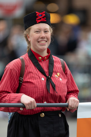 Holland, Michigan, USA - May 11, 2019: Tulip Time Parade, Woman smiles, wearing a traditional dutch outfit during the paradeのeditorial素材