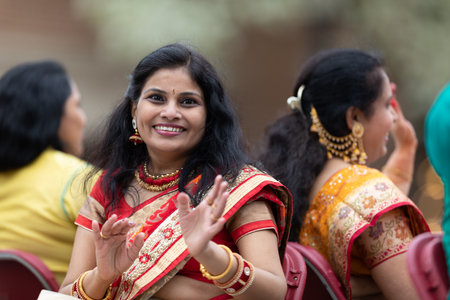 Holland, Michigan, USA - May 11, 2019: Tulip Time Parade, Indian woman smiling for the camera, wearing traditional clothing during the paradeのeditorial素材
