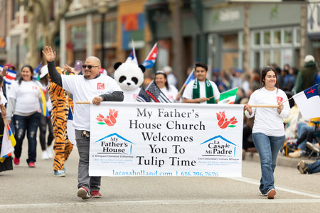 Holland, Michigan, USA - May 11, 2019: Tulip Time Parade, Latinos Promoting My Father's House, Christian Church during the paradeのeditorial素材