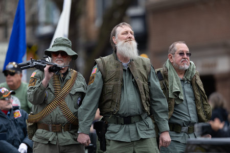 Holland, Michigan, USA - May 11, 2019: Tulip Time Parade, Float transporting United States Military Veterans  down the road during the paradeのeditorial素材