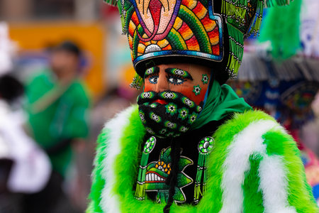 Chicago, Illinois, USA - September 8, 2019: 26th Street Mexican Independence Parade, Man  dress up as chinelo, mexican traditional dancer outfit during the paradeのeditorial素材