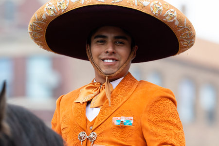 Chicago, Illinois, USA - September 8, 2019: 26th Street Mexican Independence Parade, Man riding a horse waring a mariachi outfit at the paradeのeditorial素材