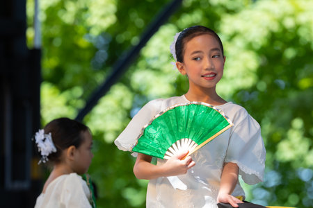 St. Louis, Missouri, USA - August 24, 2019: Festival of Nations, Tower Grove Park, Members of the Philippine Art Foundation, wearing traditional clothing, performing traditional Filipino dancesのeditorial素材