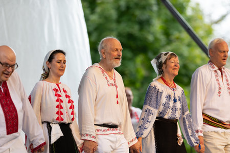St. Louis, Missouri, USA - August 25, 2019: Festival of Nations, Tower Grove Park, Members of the International Folk Dance Association, wearing traditional clothing, performing traditional European dancesのeditorial素材