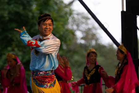 St. Louis, Missouri, USA - August 25, 2019: Festival of Nations, Tower Grove Park, Members of the St. Louis Modern Chinese School, wearing traditional clothing, performing traditional dances from Chinaのeditorial素材