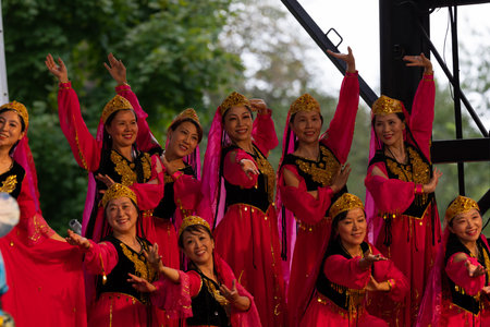 St. Louis, Missouri, USA - August 25, 2019: Festival of Nations, Tower Grove Park, Members of the St. Louis Modern Chinese School, wearing traditional clothing, performing traditional dances from Chinaのeditorial素材