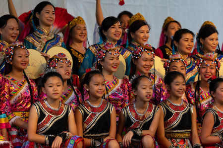 St. Louis, Missouri, USA - August 25, 2019: Festival of Nations, Tower Grove Park, Members of the St. Louis Modern Chinese School, wearing traditional clothing, performing traditional dances from Chinaのeditorial素材