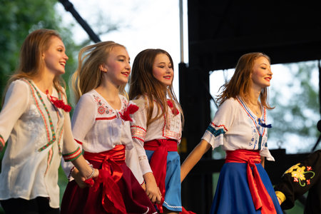 St. Louis, Missouri, USA - August 25, 2019: Festival of Nations, Tower Grove Park, Members of the dance group Courage, wearing traditional clothing, performing traditional dances from Russiaのeditorial素材