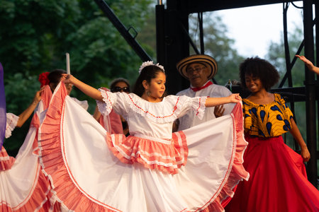 St. Louis, Missouri, USA - August 25, 2019: Festival of Nations, Tower Grove Park, members of the Grupo Atlantico, wearing traditional clothing, performing traditional  dances from Colombiaのeditorial素材