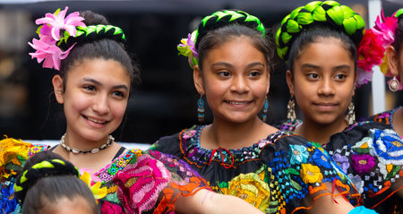 St. Louis, Missouri, USA - August 25, 2019: Festival of Nations, Tower Grove Park, members of the Mexican Dance Ministerio Guadalupe, wearing traditional clothing, posing for the cameraのeditorial素材