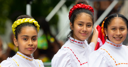 St. Louis, Missouri, USA - August 25, 2019: Festival of Nations, Tower Grove Park, members of the Mexican Dance Ministerio Guadalupe, wearing traditional clothing, posing for the cameraのeditorial素材