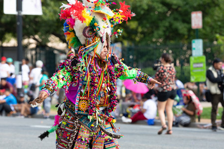 Washington DC, USA - September 21, 2019: The Fiesta DC, Bolivian dancers performing the Dance of the Tinkus during the paradeのeditorial素材