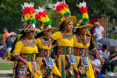 Washington DC, USA - September 21, 2019: The Fiesta DC, Bolivian dancers performing the Dance of the Tinkus during the paradeのeditorial素材