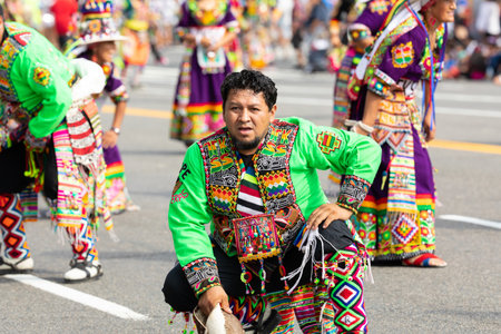 Washington DC, USA - September 21, 2019: The Fiesta DC, Bolivian dancers performing the Dance of the Tinkus during the paradeのeditorial素材