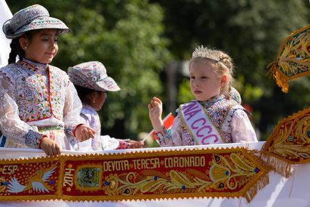 Washington DC, USA - September 21, 2019: The Fiesta DC, Children on a float, wearing traditional peruvian clothing during the paradeのeditorial素材