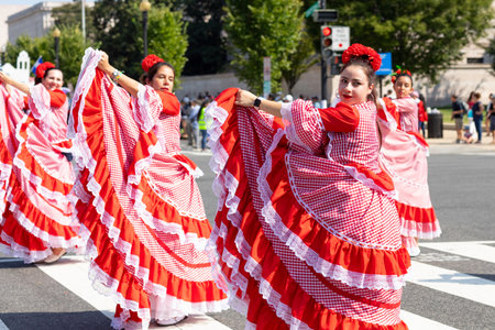 Washington DC, USA - September 21, 2019: The Fiesta DC, Colombian women wearing traditional clothing, performing Cumbia dance during the paradeのeditorial素材