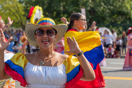 Washington DC, USA - September 21, 2019: The Fiesta DC, Colombian dancer wearing traditional clothing smiles and looks at the camera during the paradeのeditorial素材