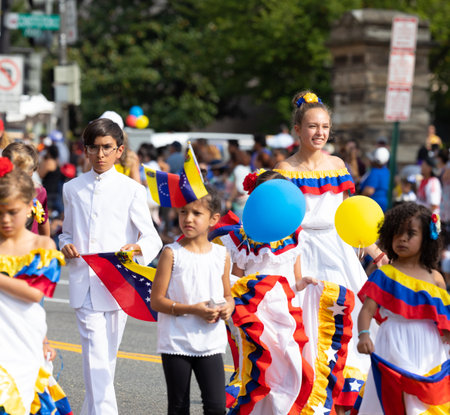 Washington DC, USA - September 21, 2019: The Fiesta DC, Venezuelan children dancing Joropos, wearing traditional dresses during the paradeのeditorial素材