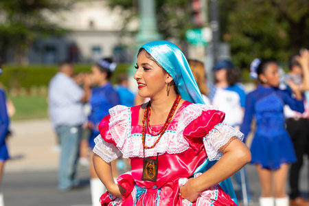 Washington DC, USA - September 21, 2019: The Fiesta DC, Salvadorean dancers wearing traditional clothing, performing Chalatenango traditional dance during the paradeのeditorial素材