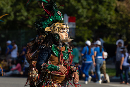 Washington DC, USA - September 21, 2019: The Fiesta DC, The Fiesta DC Parade, guatemalans wearing traditional clothing representing the Indigenous peoples of guatemala wearing abstract maskのeditorial素材