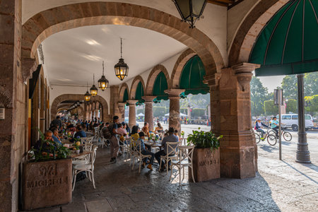 Morelia, Michoacan, Mexico - November 24, 2019: People eating lunch at the restaurants along Mexico 15, infront of the Plaza de Armasのeditorial素材