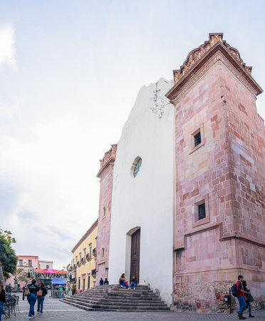 Zacatecas, Zacatecas, Mexico - November 22, 2019: People resting and walking by the ex templo de San AgustÃ­n, now a museumのeditorial素材