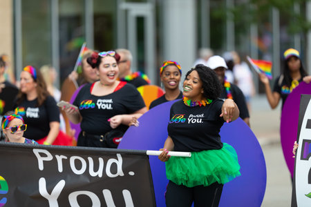 Cincinnati, Ohio, USA - June 22, 2019: The Cincinnati Pride Parade, Group of women wearing shirts...