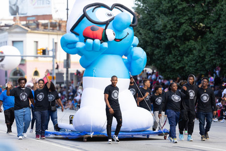 Indianapolis, Indiana, USA - September 28, 2019: The Circle City Classic Parade, People pulling a...