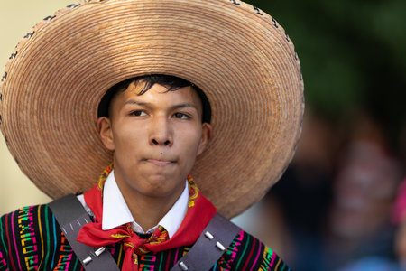 Matamoros, Tamaulipas, Mexico - November 20, 2019: The Mexican Revolution Day Parade, Revolutionaries wearing traditional clothing, going down Sexta street during the paradeのeditorial素材