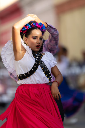 Matamoros, Tamaulipas, Mexico - November 20, 2019: The Mexican Revolution Day Parade, Mexican traditional dancers wearing traditional clothing performing at the paradeのeditorial素材