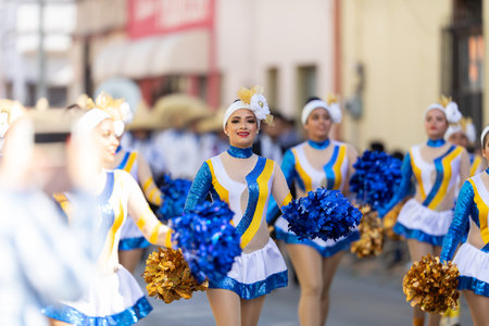 Matamoros, Tamaulipas, Mexico - November 20, 2019: The Mexican Revolution Day Parade, young mexican cheerleaders dancing down Sexta Street during the paradeのeditorial素材