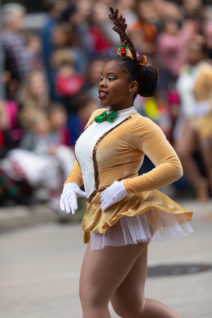 Houston, Texas, USA - November 28, 2019: H-E-B Thanksgiving Day Parade, young women dress up as reindeers, dancing at the paradeのeditorial素材