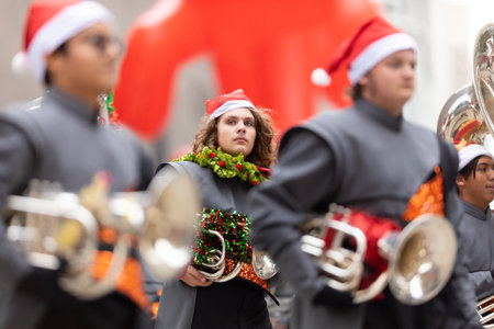 Houston, Texas, USA - November 28, 2019: H-E-B Thanksgiving Day Parade, Members of the High School Marching Band Jacketeers, performing at the paradeのeditorial素材