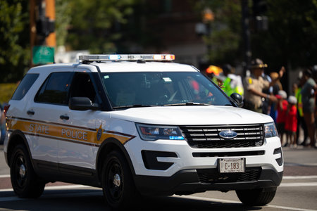 Chicago, Illinois, USA - August 8, 2019: The Bud Billiken Parade, Members of the Illinois State Police going down Martin Luther King Dr, during the paradeのeditorial素材