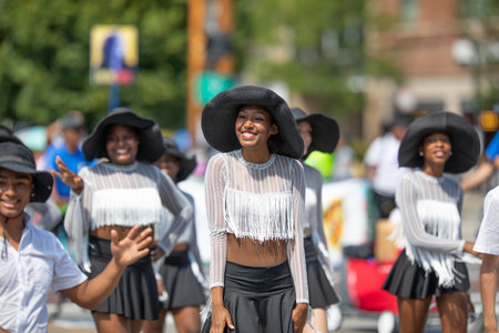 Chicago, Illinois, USA - August 8, 2019: The Bud Billiken Parade, Members of the Joffrey Ballet Team, waving and smiling at the spectatorsのeditorial素材
