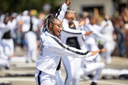 Chicago, Illinois, USA - August 8, 2019: The Bud Billiken Parade, Members of the South Shore Drill Team performing at the paradeのeditorial素材