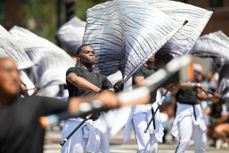 Chicago, Illinois, USA - August 8, 2019: The Bud Billiken Parade, Members of the South Shore Drill Team performing at the paradeのeditorial素材