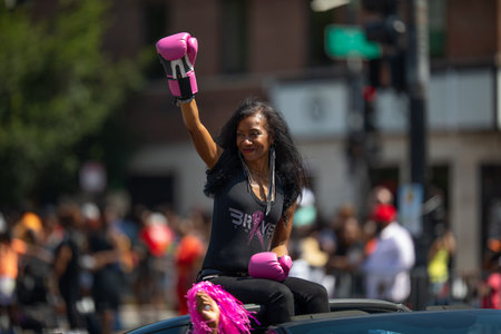Chicago, Illinois, USA - August 8, 2019: The Bud Billiken Parade, Erika Bracey, breast cancer awareness promoter at the paradeのeditorial素材