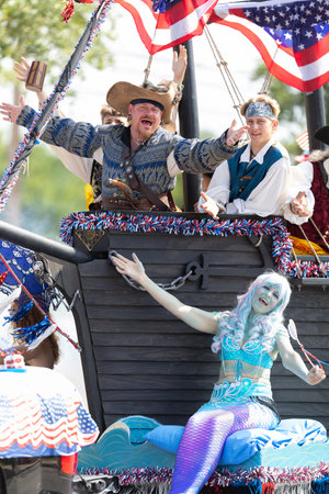 Arlington, Texas, USA - July 4, 2019: Arlington 4th of July Parade, Float in shape of a Pirate ship,...