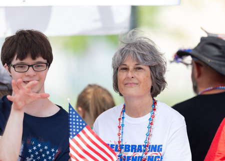 Arlington, Texas, USA - July 4, 2019: Arlington 4th of July Parade, Members of the Green Oaks School, riding on a wagon at the paradeのeditorial素材