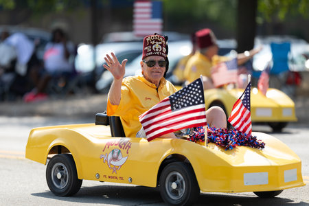 Arlington, Texas, USA - July 4, 2019: Arlington 4th of July Parade, Members of Moslah, riding...