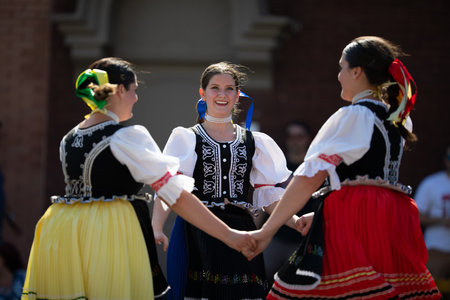 Whiting, Indiana, USA - July 27, 2019: Pierogi Fest, Ladies wearing traditional clothing, performing a dance in a circleのeditorial素材