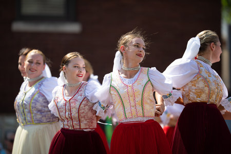 Whiting, Indiana, USA - July 27, 2019: Pierogi Fest, Ladies wearing traditional clothing, performing a dance in a circleのeditorial素材