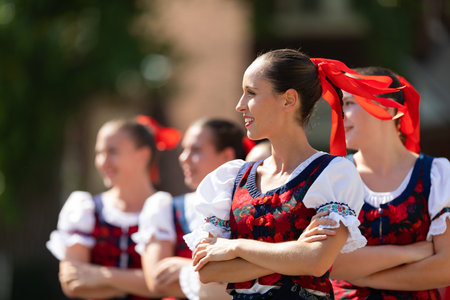 Whiting, Indiana, USA - July 27, 2019: Pierogi Fest, Slovakian women wearing traditional clothing dancing among themselvesのeditorial素材
